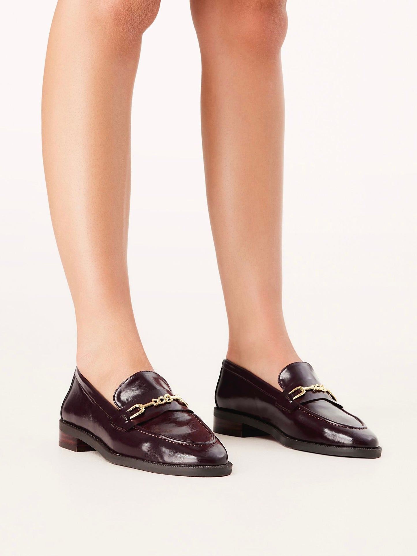 Models legs wearing Warren Loafers in Merlot