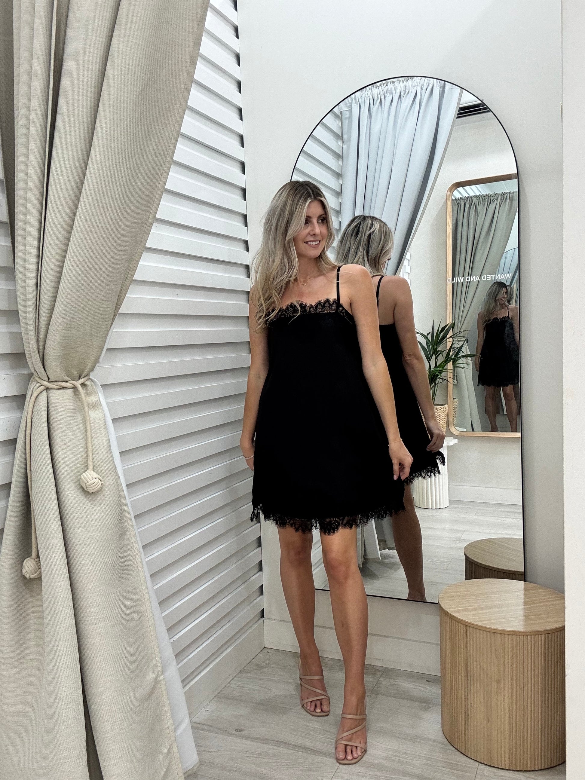 Ace Dress in black – minimalist sleeveless midi dress for day to night wear