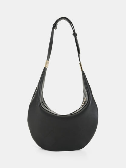 A black leather hobo shoulder bag with a single adjustable strap and small gold-tone hardware, Billini Bags at Wanted and Wild