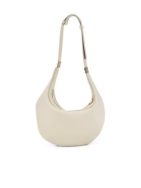 An off-white leather crescent-shaped shoulder bag with a thin metallic silver shoulder strap, shown against a plain white background.