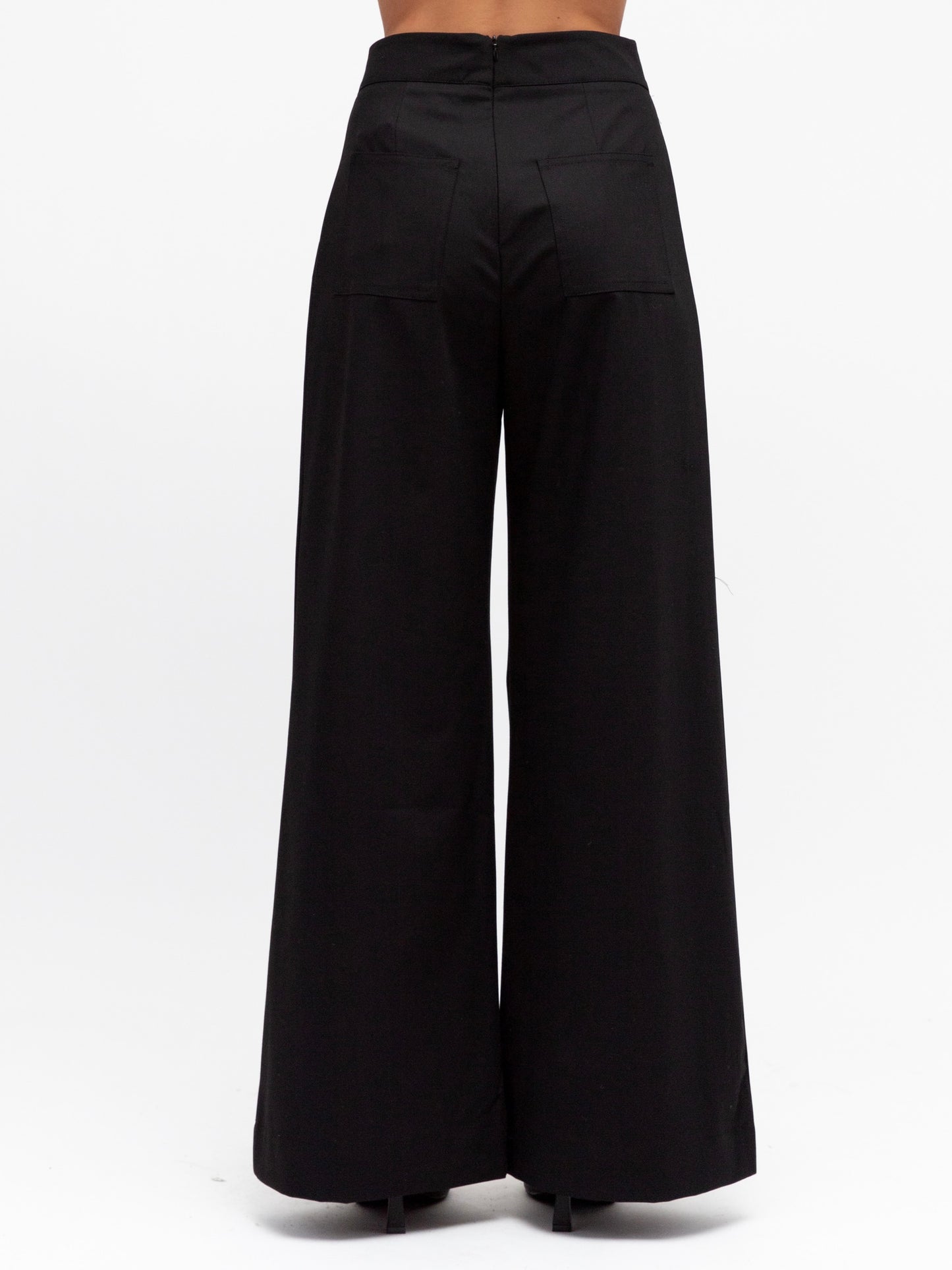 Back view of luxe suit pants worn with the sienna top by white closet at Wanted and Wild. 