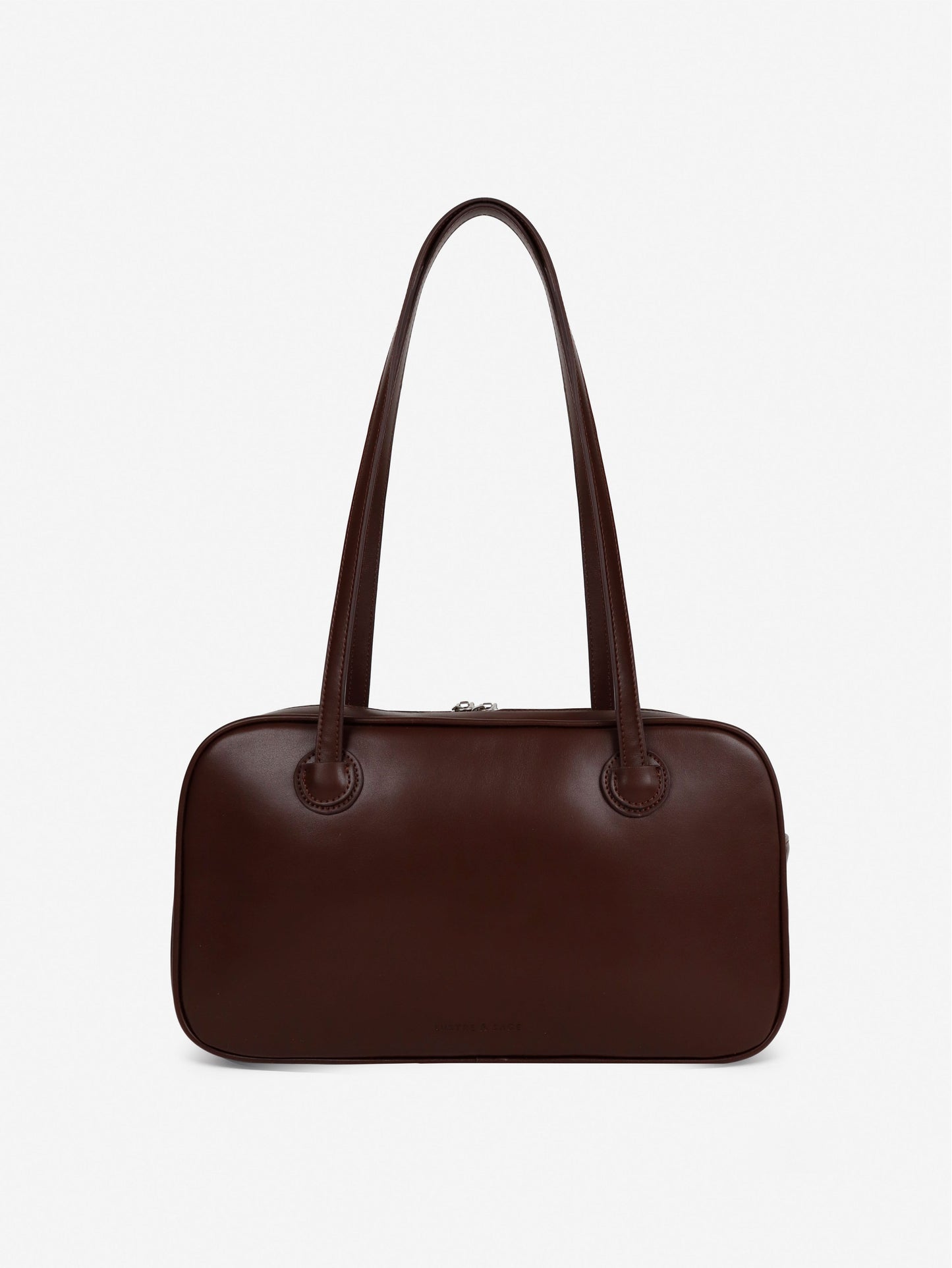 Brown handbag on a light gray background
