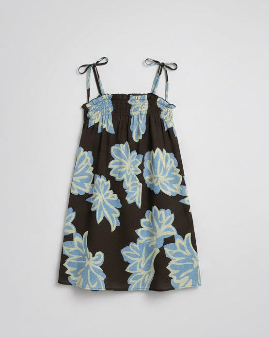 A Flat Lay Picture Of The Elderflower Mini Dress By Frankie available in sizes XS to XL at Wanted and Wild, Gymea.