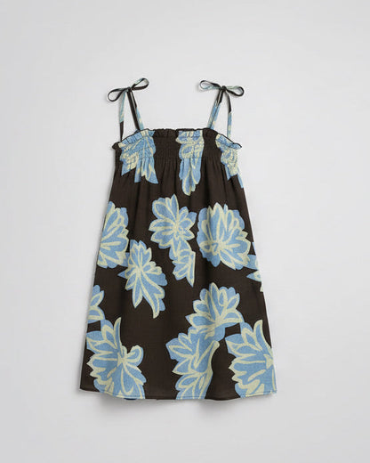 A Flat Lay Picture Of The Elderflower Mini Dress By Frankie available in sizes XS to XL at Wanted and Wild, Gymea.