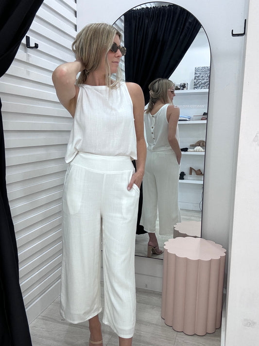 The Mari pants in White worn with The Mari Top in White by Wanted and Wild.