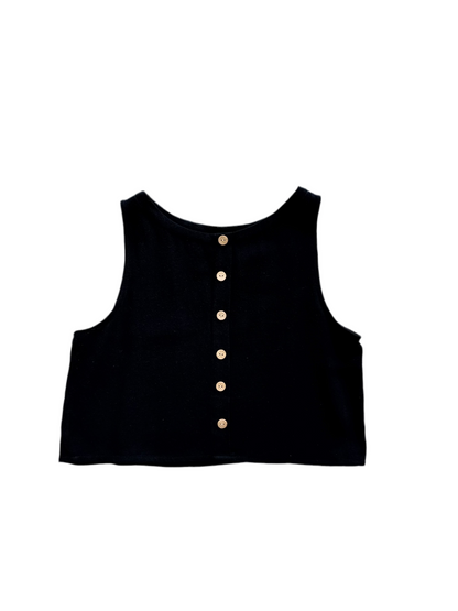 A flat Lay picture of The Mari Top in Black, showing buttons down the back.