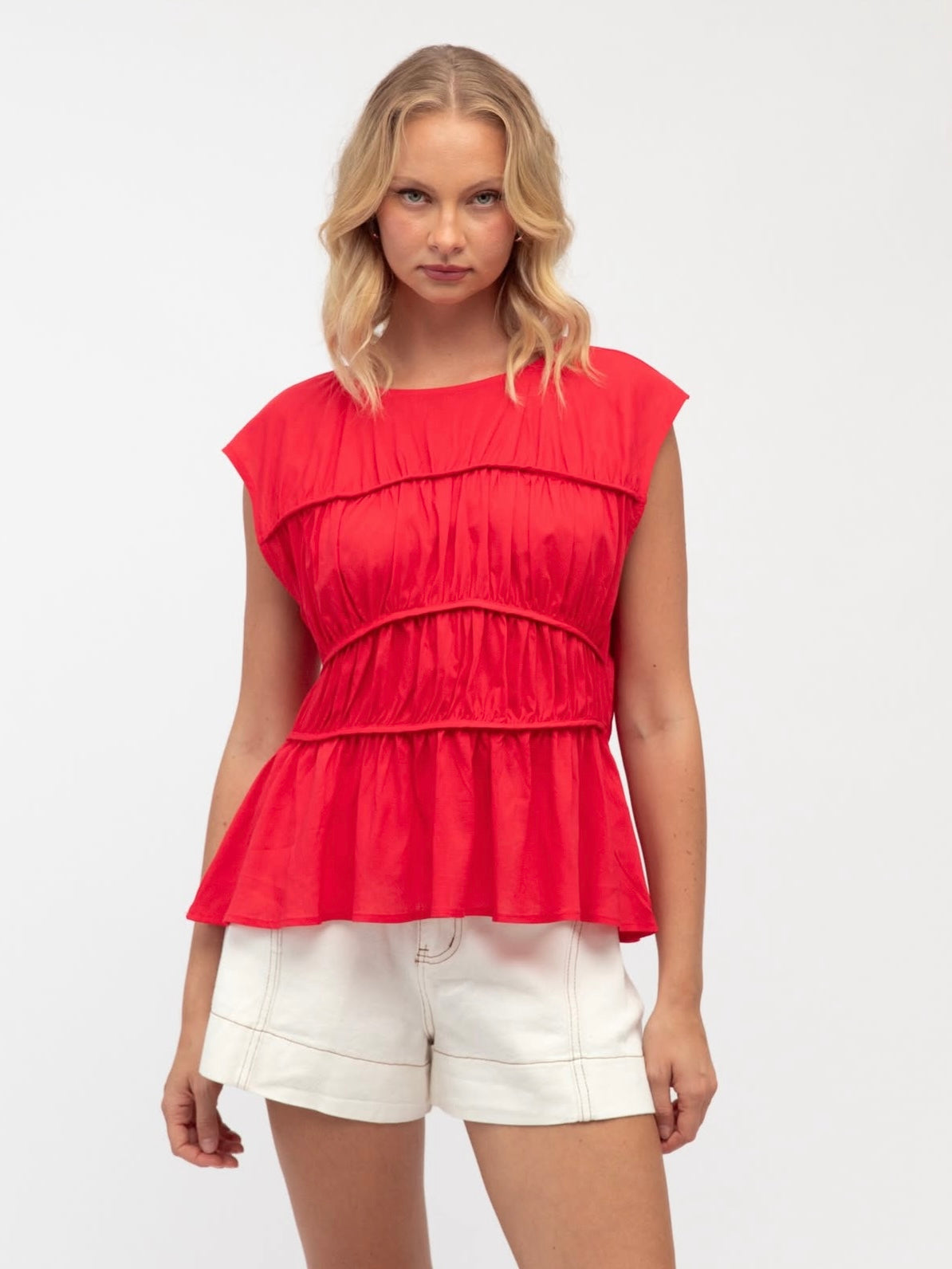 The front view of The Millie Top in Red at Wanted and Wild.