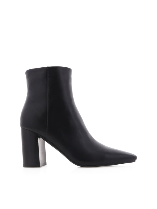 Black ankle boot on a white background