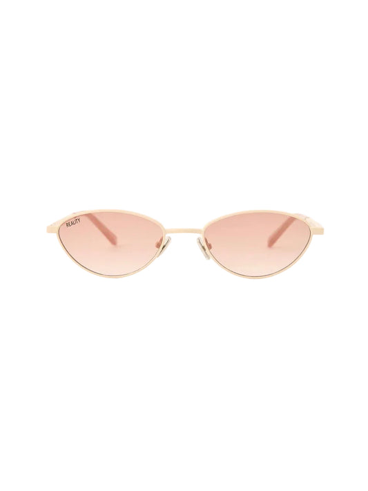 Gold-framed sunglasses with pink lenses on a white background