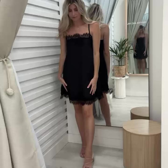 A movie of a lady modelling The Ace Dress in Black at Wanted and Wild. By Frankie brand.