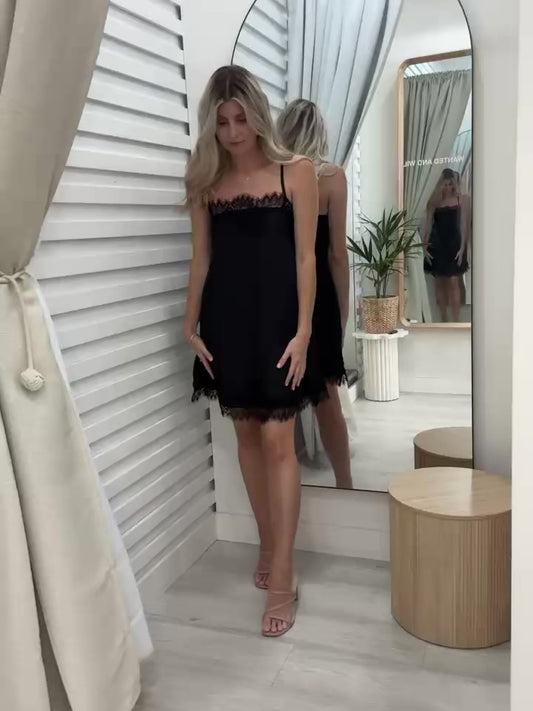 A movie of a lady modelling The Ace Dress in Black at Wanted and Wild. By Frankie brand.